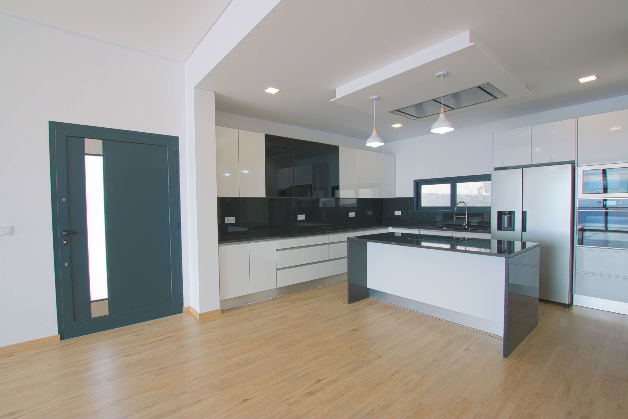 Kitchen area with central counter top