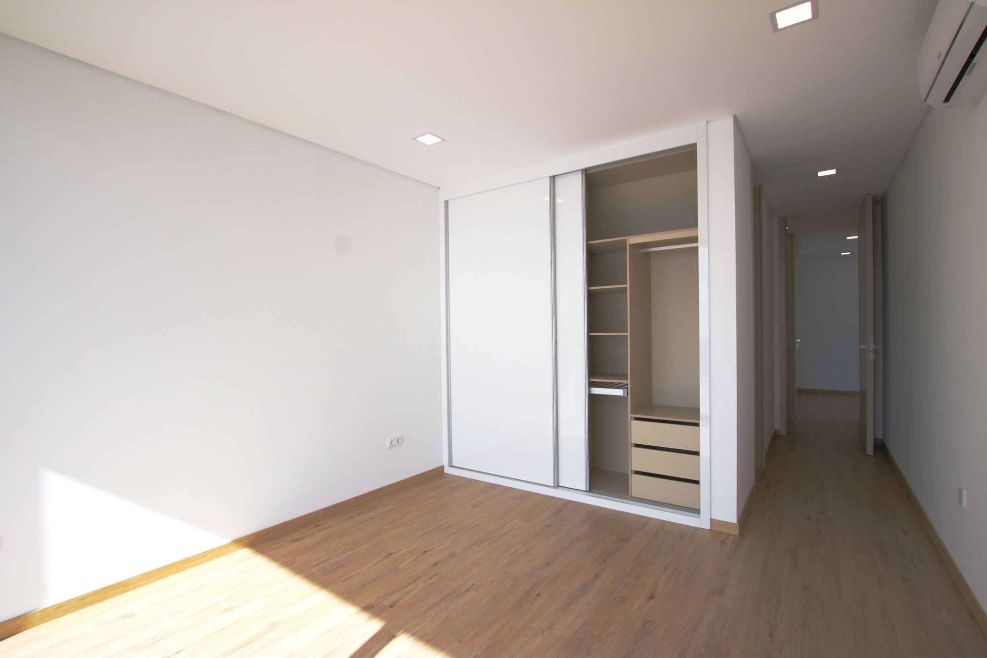 Empty bedroom with closet