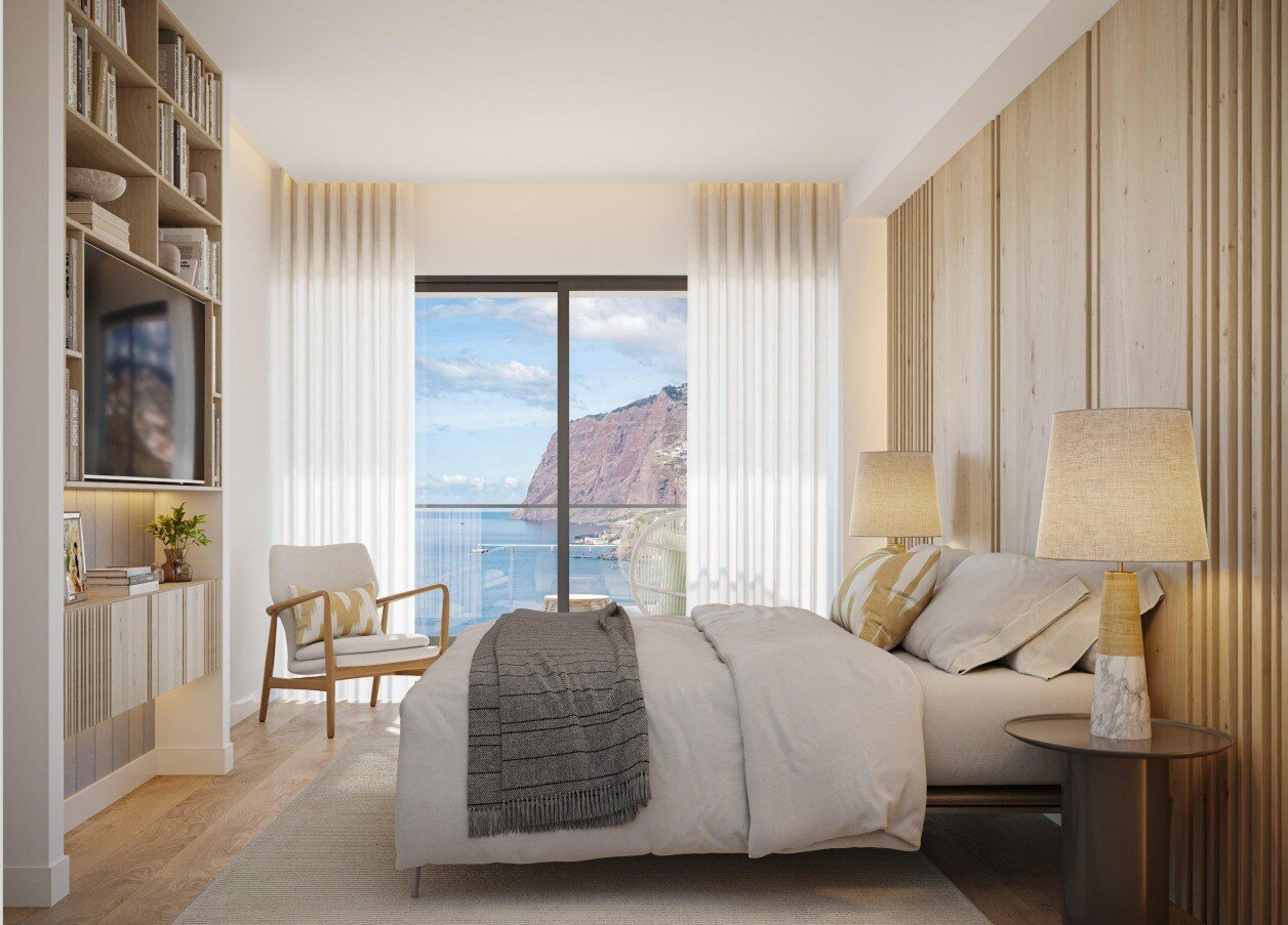 Show home bedroom with a sea view