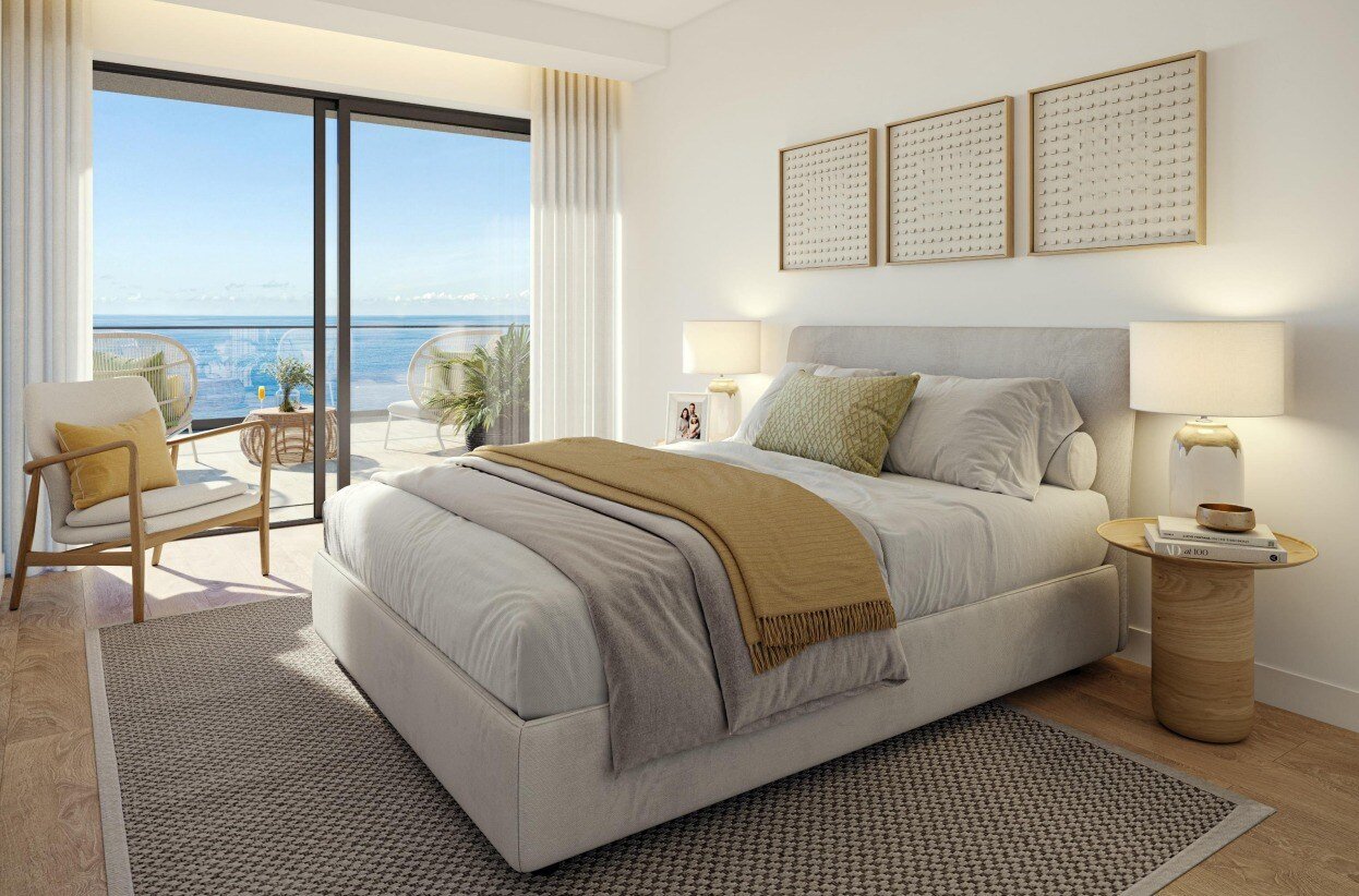 Show home bedroom with a sea view