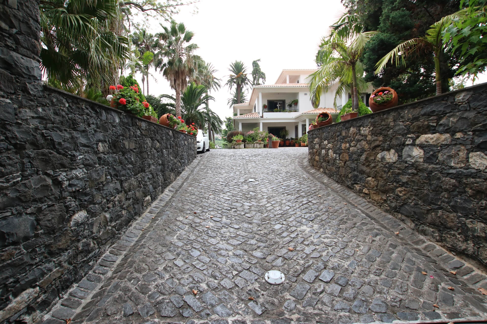 The entrance to the house with the front facade of the house